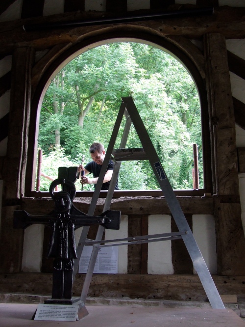 By midday the old window is gone and the new frame is being installed. Photo: Artemisia